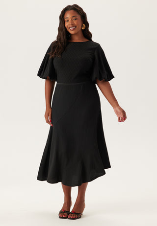 Structured Asymmetric Skirt